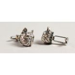 A PAIR OF SILVER BULLDOG CUFFLINKS.