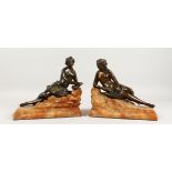 A SUPERB PAIR OF BRONZE NUDE FIGURES laying on an alabaster base. French, circa 1900. 8.5ins long