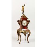 A MINIATURE FRENCH LOUIS XVITH DESIGN CLOCK with ormolu mounts and four curving ormolu legs. 13ins