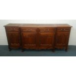 A FRENCH STYLE SIDEBOARD, with four frieze drawers over four panelled doors, 7' 7" long x 3' 4" high