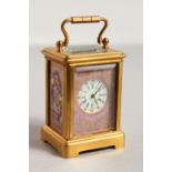 A MINIATURE BRASS SEVRES TYPE CARRIAGE CLOCK with pink porcelain panels. 2.25ins.