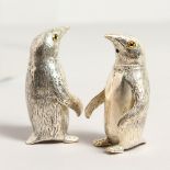 A PAIR OF .800 SILVER PENGUIN SALT AND PEPPERS.