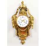 A GOOD LOUIS XVITH ORMOLU CARTEL CLOCK with seven inch blue and white enamel dial, eight day