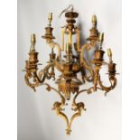 A 19TH CENTURY FRENCH LOUIS XVITH DESIGN EIGHT LIGHT CANDELABRA with scrolling branches. 2ft long.