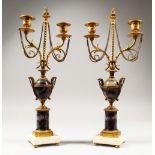 A PAIR OF GEORGE III TWO BRANCH BLUE JOHN AND ORMOLU CANDLESTICKS Attributed to MATTHEW BOULTON