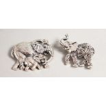 TWO SILVER ELEPHANT BROOCHES.