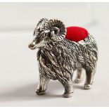 A CAST SILVER NOVELTY RAM PIN CUSHION.