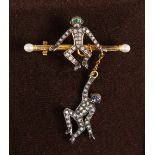 A LOVELY DIAMOND SET MONKEY BROOCH.