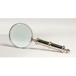 A MAGNIFYING GLASS with plain plate handle.