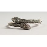 A SILVER AND MARCASITE SNAKE BRACELET.