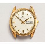 AN OMEGA SEAMASTER GOLD WRISTWATCH (no strap).