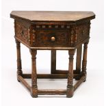 A 17TH CENTURY STYLE OAK "CREDENCE" TABLE, with shaped hinged top, carved frieze drawer on turned