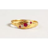 A 15CT GOLD RUBY AND DIAMOND RING.
