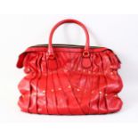 A RED VALENTINO LEATHER BAG with gilt studs.