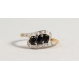 A 9CT GOLD SAPPHIRE AND DIAMOND RING.