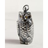 A SILVER PLATE SOVEREIGN CASE as an owl.