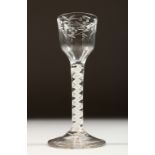A GEORGIAN WINE GLASS, the bowl engraved with flowers and white air twist stem. 6ins high.