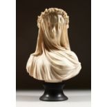 A. FIRENZE, ITALY. A GOOD COMPOSITION WHITE BUST OF A YOUNG GIRL wearing a veil. 13ins high..