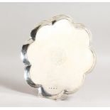 A RARE GEORGE II QUATREFOIL SHAPED SALVER with plain raised edge, on four bracket feet. 12.5ins