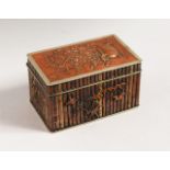 A GOOD JAPANESE SILVER BOX AND COVER, bamboo type sides, flowers and birds. 3ins x 2ins x 1.75ins.