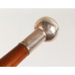 A PLAIN SILVER HANDLED WALKING CANE. Birmingham hallmarks. 3ft long.