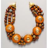 A LARGE NATIVE AMBER LIKE STONE AND BEAD SILVER GILT NECKLACE set with five large amber like