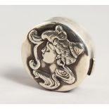 A SILVER EMBOSSED ART NOUVEAU PILL BOX.