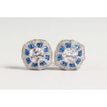 A PAIR OF SILVER FAUX SAPPHIRE DECO STYLE EARRINGS.