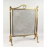 A FRENCH BRASS FIRE SCREEN with mesh front, on curving legs. 2ft 9ins high.