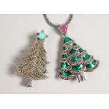 A SILVER AND MARCASITE CHRISTMAS TREE PENDANT AND BROOCH.