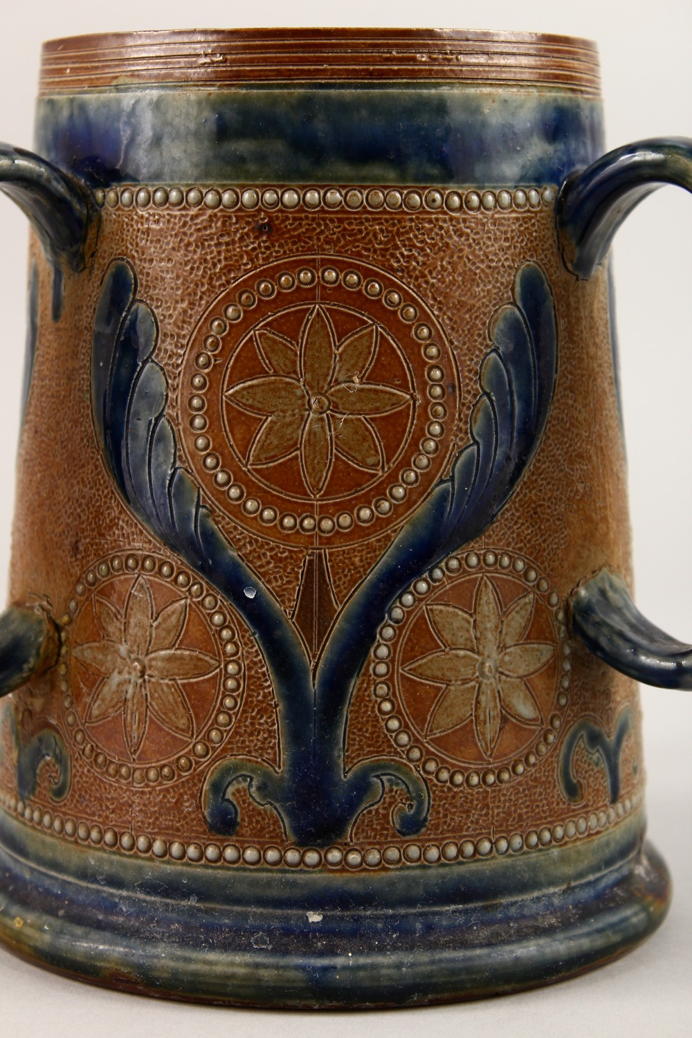 A DOULTON STONEWARE THREE HANDLED TYG with blue decoration. 7ins high. - Image 2 of 9