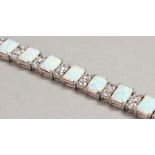 A SILVER AND GILSON OPAL SQUARE CUT LINE BRACELET.