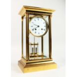 A GOOD 19TH CENTURY FRENCH FOUR GLASS CLOCK by LANGRO with eight day movement and column sides.