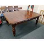 A GOOD VICTORIAN STYLE MAHOGANY EXTENDING DINING TABLE, by Frank Hudson & Son, with three leaves, on