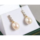 A PAIR OF 9CT GOLD, DIAMOND AND PEARL DROP EARRINGS.