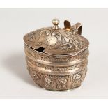 A GEORGE III OVAL MUSTARD POT repousse with roses, no liner. London 1808.