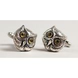 A PAIR OF OWL FACE CUFFLINKS.