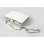 A BETH JORDAN WHITE & SILVER EVENING BAG with shoulder strap.