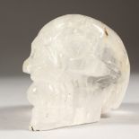 A ROCK CRYSTAL SKULL. 4.5ins long.