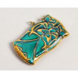 AN ART NOUVEAU DESIGN BRASS AND ENAMEL VESTA.