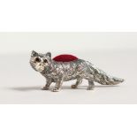 A CAST SILVER FOX PIN CUSHION.