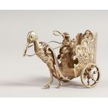 A DUTCH SILVER STORK PULLING A CARRIAGE.