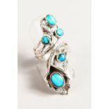 A SILVER REAL OPAL NATURLISTIC RING.