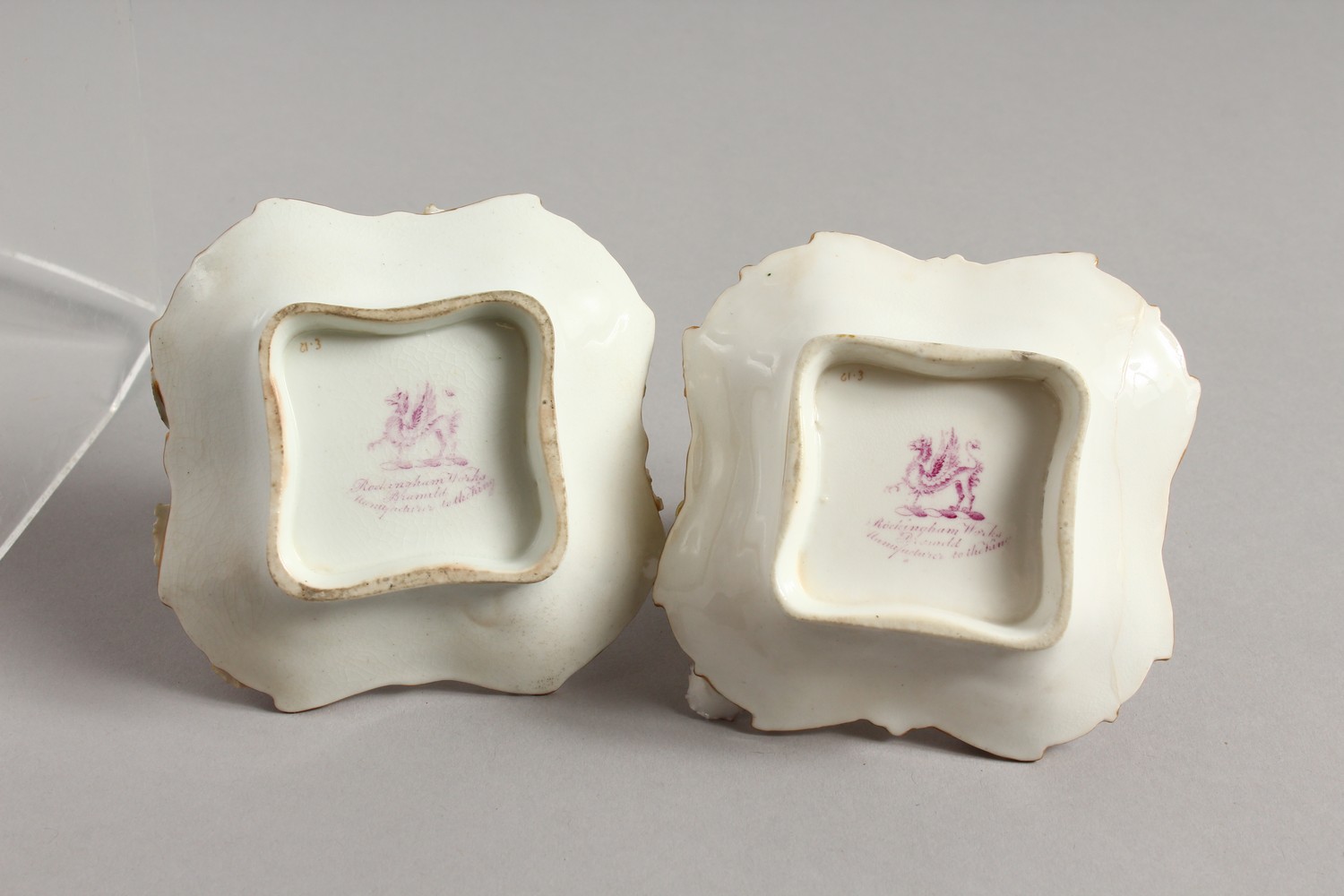 A SMALL PAIR OF ROCKINGHAM BASKETS, the centres painted with a cottage and encrusted with flowers. - Image 5 of 9