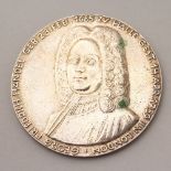 A COMMEMORATIVE SILVER MEDALLION "HANDEL". 3.5ins diameter.