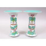 A GOOD PAIR OF CHINESE FLARED RIM PORCELAIN DOUCAI VASES, the body decorated with scenes of lotus