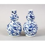 A GOOD PAIR OF 19TH CENTURY CHINESE MINIATURE BLUE & WHITE DOUBLE GOURD SHAPED PORCELAIN VASES,