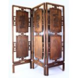 A GOOD CHINESE 19TH / 20TH CENTURY MING STYLE HARDWOOD FOLDING SCREEN, each section of the screen