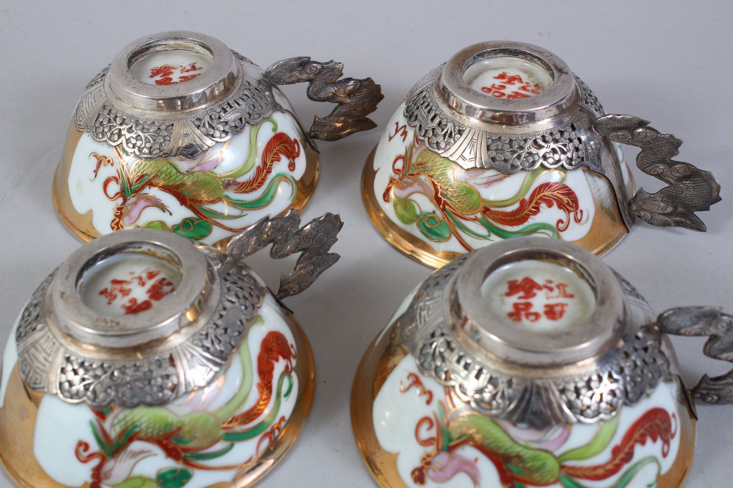 A SET OF FOUR 20TH CENTURY CHINESE FAMILLE ROSE PORCELAIN AND SILVER MOUNTED CUPS & SAUCERS, the - Image 7 of 8