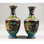 A PAIR OF 20TH CENTURY CHINESE CLOISONNE DRAGON VASES, the vases with wired decoration depicting